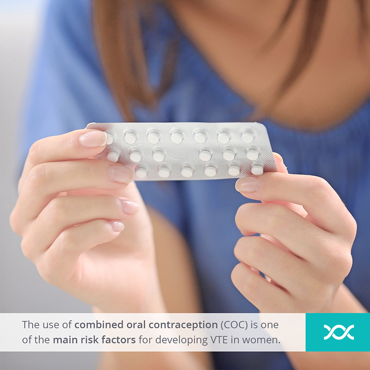 Woman holding a strip of contraceptive pills