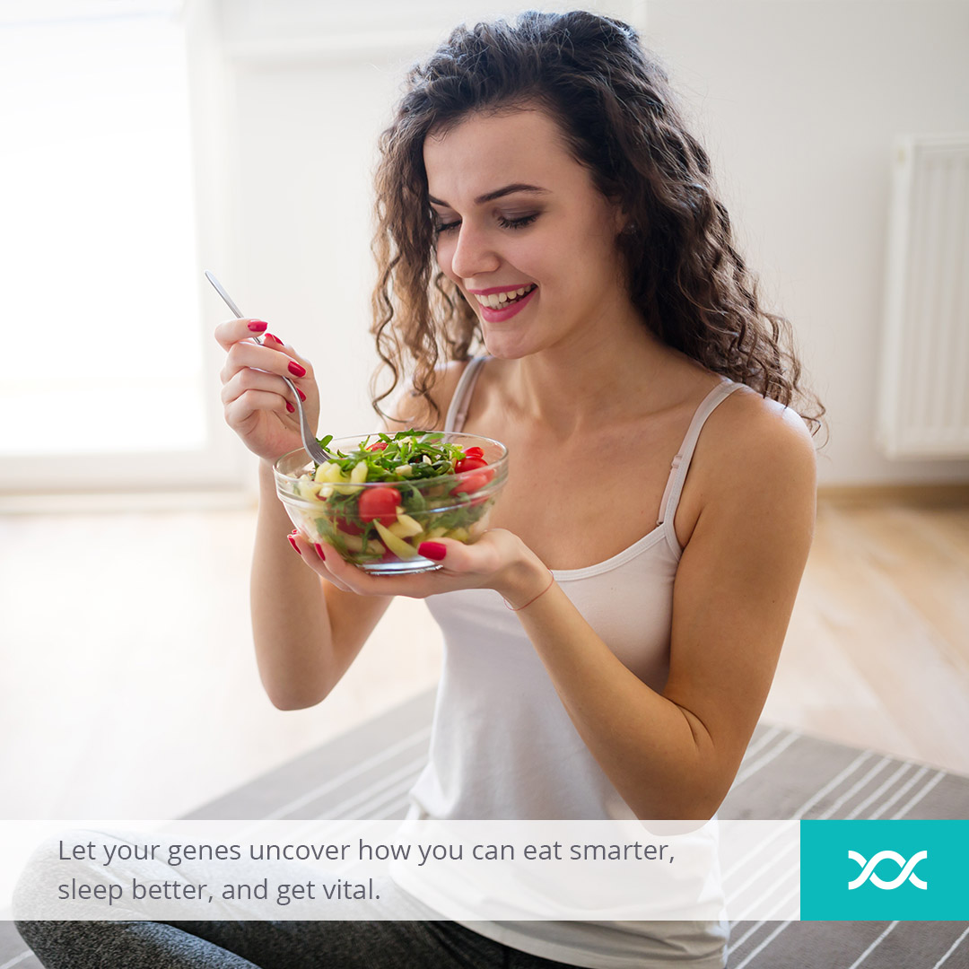 Young woman eating a salad