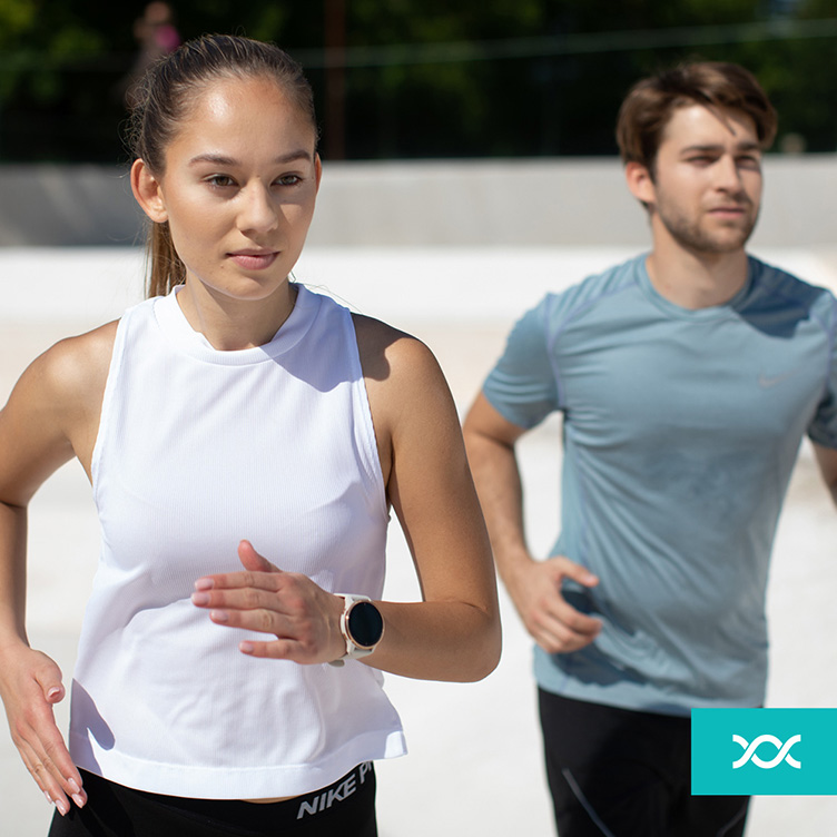 A girl and a boy jogging