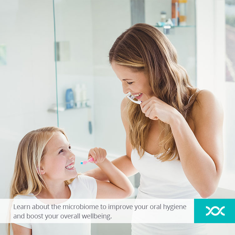 Mother and daughter washing their teeth in the bathroom